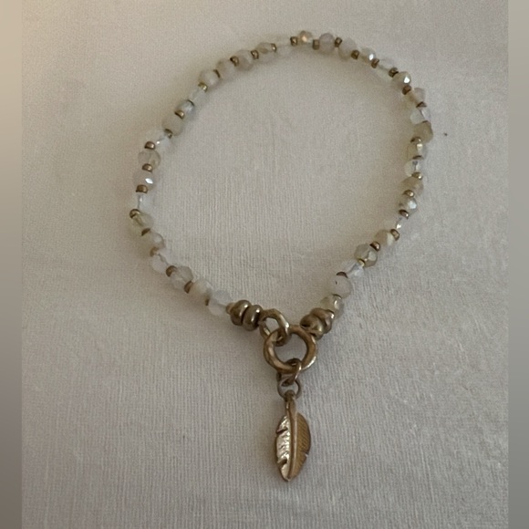 Beaded Bracelet with Feather Charm in Gold - Picture 2 of 2